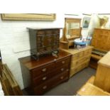 Edwardian oak dressing table and four drawer chest