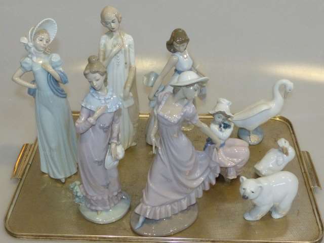 Collection of six Nao figures,