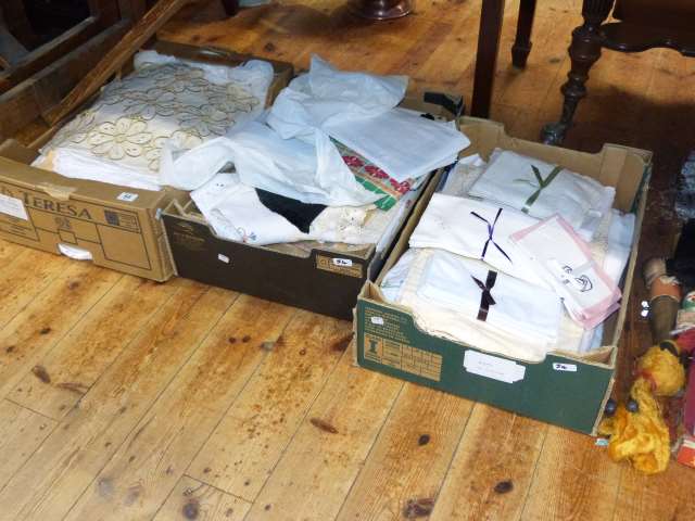 Three boxes of table linen