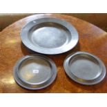 Three antique pewter plates