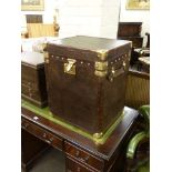 As new brown leather and metal bound storage trunk