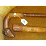 Two wooden staffs