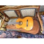 Suzuki acoustic guitar and canvas bag
