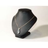 Aquamarine and diamond pendant necklace,