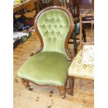 Victorian mahogany framed spoon back nursing chair in deep buttoned green draylon