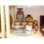 Satsuma and Oriental vases, blue and white plates,