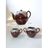 Edwardian silver-mounted pottery three-piece tea service, Henry Bourne,