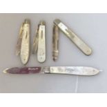 Four 19th Century silver and mother-of-pearl folding fruit knives