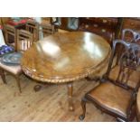Fine 19th Century oval burr walnut loo table bearing, bearing Harrod's retailers label,