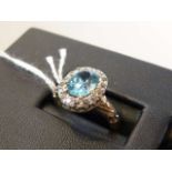 Blue zircon and diamond ring,