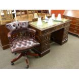 Georgian style eight-drawer mahogany pedestal desk and swivel desk chair