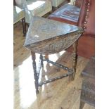 Carved oak triangular drop leaf occasional table on bobbin legs