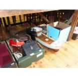 Collection of cameras, binoculars, model boat, toy sewing machine, Victorian teapot,
