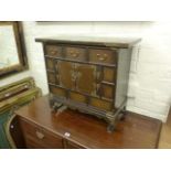 Oriental style brass mounted three drawer table cabinet