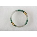 BRACELET - Chinese White and Green Jade Hinged Bangle Bracelet with yellow gold mount, with