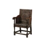 17TH C WAINSCOT ARMCHAIR - English Oak Court or Ecclesiastical Chair with vaguely Celtic carvings to