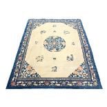 ANTIQUE CHINESE CARPET - 8'9" x 11'3" - Early 20th c, circular floral rosette medallion in navy