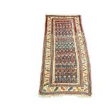 ANTIQUE CAUCASIAN RUG - 3 1/2' X 7'2" - Late 19th c, staggered rows of stylized palmette motifs in