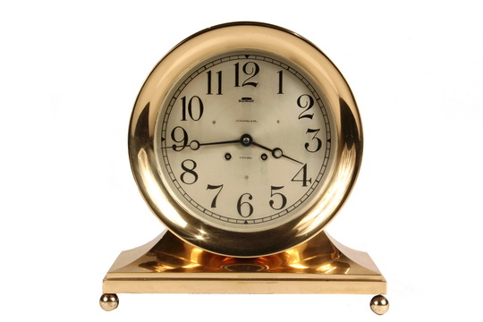 SHIP'S DESK CLOCK - Solid Rose Brass Cased Chelsea 8 1/2" Desk Clock, the dial marked by AE Caldwell