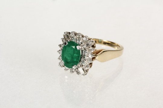 LADY'S RING - 14K Yellow Gold Ring Set with Oval Cabochon Emerald and (28) Diamond Melees; size 8.