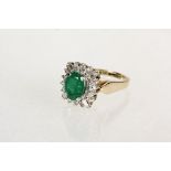 LADY'S RING - 14K Yellow Gold Ring Set with Oval Cabochon Emerald and (28) Diamond Melees; size 8.