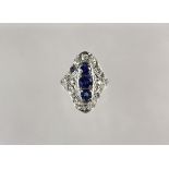 LADY'S RING - Edwardian Platinum, Sapphire and Diamond Dinner Ring; size 6 1/2.