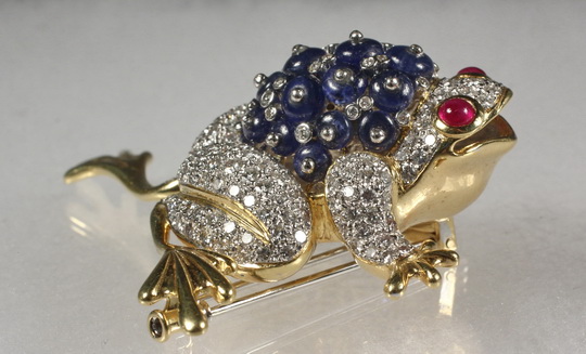BROOCH - One 18K Yellow Gold, Sapphire, Ruby and Diamond Frog Form Brooch. Blue sapphires weigh