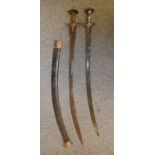 **TWO INDIAN SWORDS (TALWAR), LATE 19TH CENTURY the first with curved fullered blade and