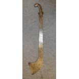 A NEPALESE SWORD (KORA), LATE 19TH/20TH CENTURY of characteristic form, the blade chiselled with