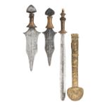 EIGHT AFRICAN EDGED WEAPONS AND THREE SPEARHEADS, 19TH/20TH CENTURY the first two daggers probably