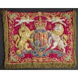 AN ELIZABETH II TRUMPET BANNER of red silk, embroidered with gold and silver thread with the crowned