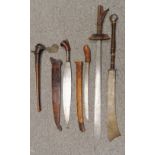 FOUR SOUTH EAST ASIAN EDGED WEAPONS AND A PACIFIC AXE, 19TH/EARLY 20TH CENTURY comprising a