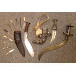 A NEPALESE KUKRI KNIFE, AN ARAB JAMBIYA AND AN INDIAN SWORD, 19TH/20TH CENTURY the first with curved