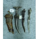 A SILVER-MOUNTED YEMENI DAGGER (JAMBIYA) AND TWO INDIAN DAGGERS (BICHWA), 19TH/20TH CENTURY the