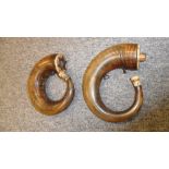 TWO NORTH AFRICAN POWDER HORNS, 19TH CENTURY each formed of a polished tightly curled horn, fitted