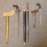 ##THREE SOUTHEAST ASIAN EDGED WEAPONS, LATE 19TH/20TH CENTURIES comprising a Patani keris, with