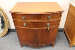 A late nineteenth century mahogany bow fronted two drawer cabinet, width 77 cm. CONDITION REPORT: