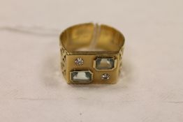 A 14ct gold diamond and aquamarine gentleman's ring. CONDITION REPORT: Good condition, gross