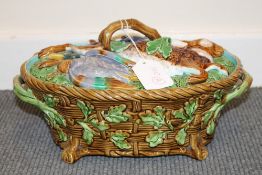 A Minton majolica game dish and cover, with impressed mark, and numbered 668, width  31 cm.