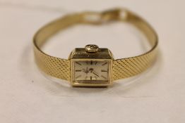 A 14ct gold Omega lady's wrist watch. CONDITION REPORT: Gross weight 19.6g.
