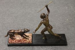 An Art Deco bronze figure of a man and wolf, on marble plinth, signed Brault, width 70 cm. CONDITION