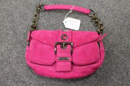 A Prada pink suede hand bag. CONDITION REPORT: Good condition, barely used.
