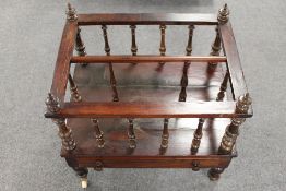 A Victorian rosewood canterbury, width 49 cm.