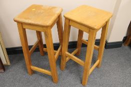 A pair of 'Seahorse Man' pine stools, height 70 cm. (2) CONDITION REPORT: Good condition.