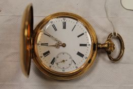 An 18ct gold hunter pocket watch. CONDITION REPORT: Good condition, the case stamped 18k. Lightly