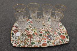 A set of eight Faberge gilded crystal wine glasses, height 23 cm. (8) CONDITION REPORT: Good