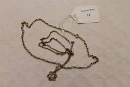 A 9ct gold necklace with pendant, together with another 9ct chain necklace, 11.5g. CONDITION REPORT: