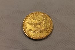 An 1893 United States of America 10 dollar gold coin, 16.7g. CONDITION REPORT: Good condition.