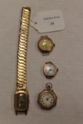 A 9ct gold gentleman's wrist watch, together with a 9ct gold fob watch and two watches. (4)