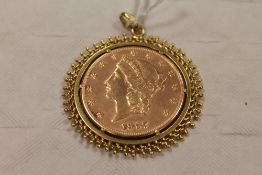 An 1897 United States of America 20 dollar gold coin, mounted as a pendant in yellow metal.
